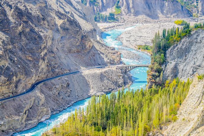 aerial photography of river surrounded by mountains